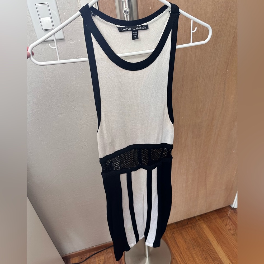 Bebe black and white thick material dress in size Medium